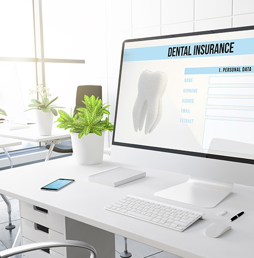 Dental insurance form on computer screen in office